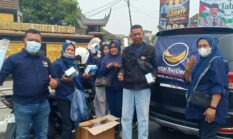 Nasdem Bukittinggi bagi 5.500 masker gratis saat kabut asap kiriman selimuti kota.